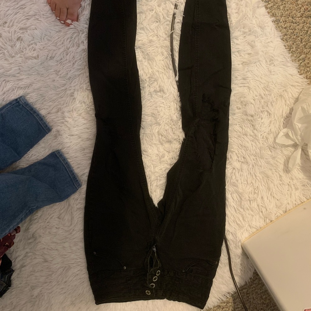 Black jeans with holes